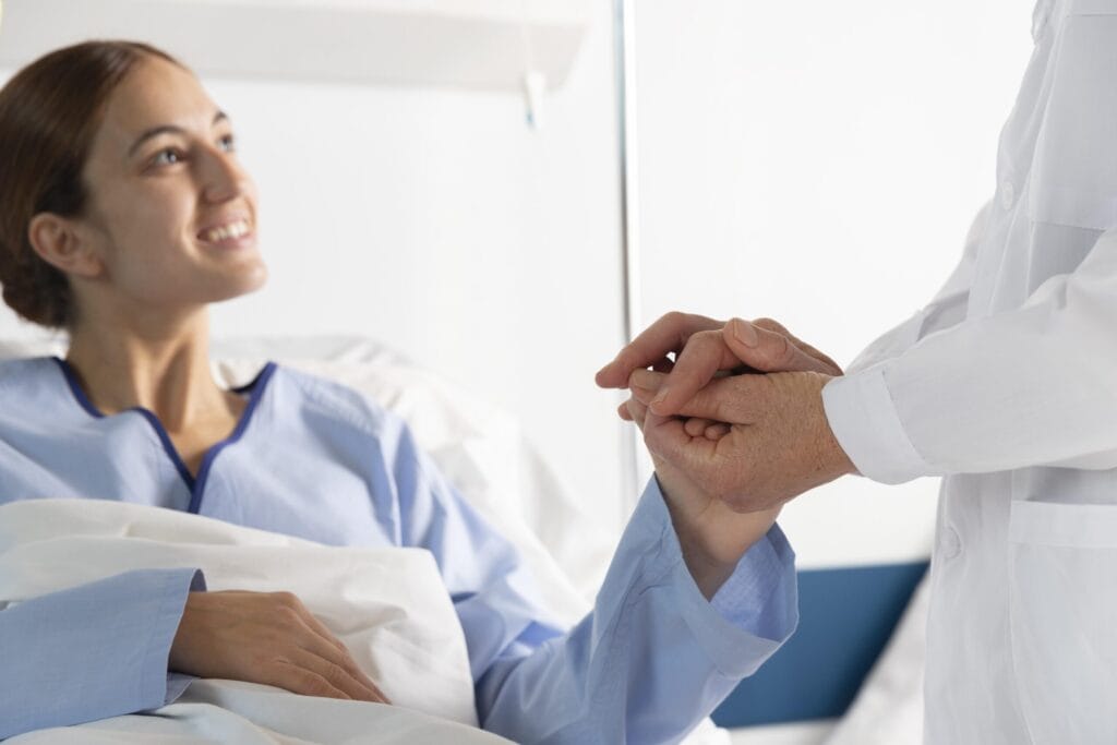 close up hands holding patient